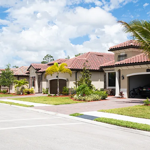 Modern family homes with fresh cut grass
